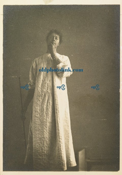 Woman in a chemise, hand over her mouth 1890